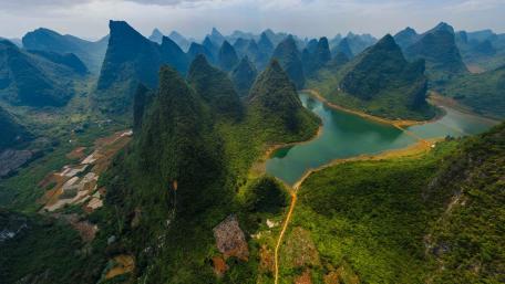 Majestic Mountain Landscape with Serene Waters wallpaper