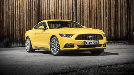 Sleek Yellow Ford Mustang Wallpaper wallpaper