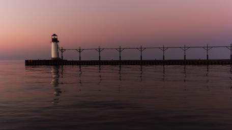 Serene Lighthouse at Dusk's Embrace wallpaper