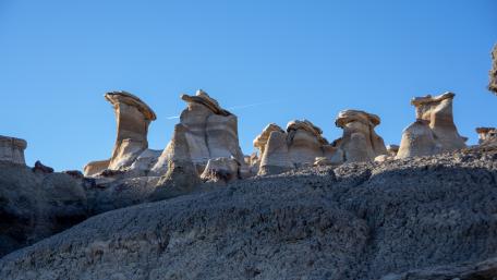 Majestic Rock Formations Under Blue Sky wallpaper