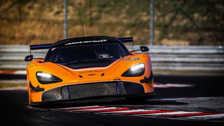 Racing Power and Precision in Motion wallpaper