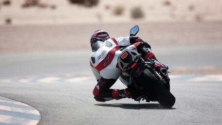 Dynamic Motorcycle Racing Action Wallpaper wallpaper