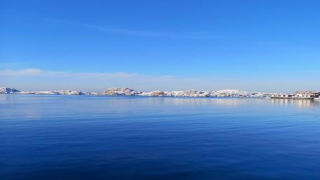 Tranquil Blue Waters and Snowy Peaks wallpaper