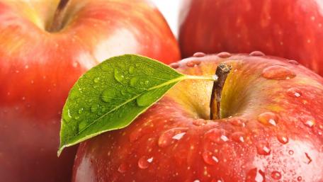 Fresh Juicy Red Apples with Dewy Surface wallpaper