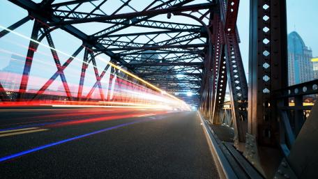 Vibrant Lights on a Bridge at Dusk wallpaper