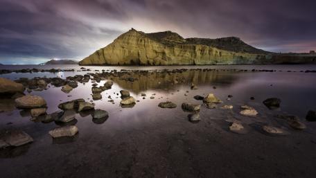 Majestic Reflections in a Cloudy Landscape wallpaper
