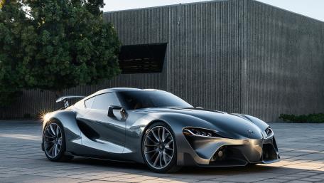Sleek Automotive Masterpiece Shining in Natural Light wallpaper