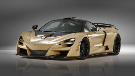 Sleek Gold Supercar Wallpaper wallpaper
