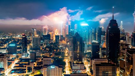 Vibrant Cityscape Under Night Sky wallpaper