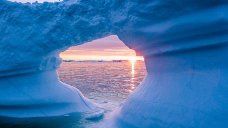 Majestic Ice Arch Overlooking Sunset wallpaper