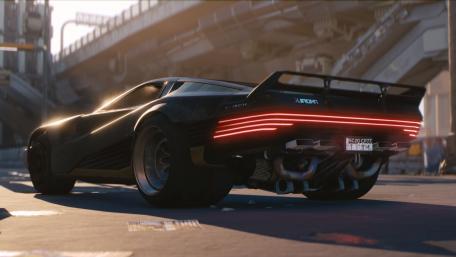 Futuristic Sportscar in Dynamic Cityscape wallpaper