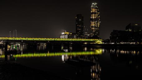 City Lights Reflection at Nighttime wallpaper