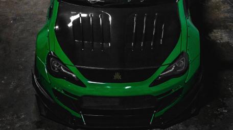 Vibrant Green Sports Car Overhead View wallpaper