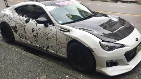 Unique Art Car with Panda Design and Sleek Finish wallpaper