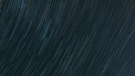 Stunning Star Trails Across a Night Sky wallpaper