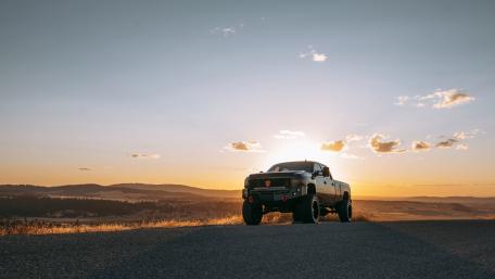 Majestic Truck Against a Sunset Horizon wallpaper
