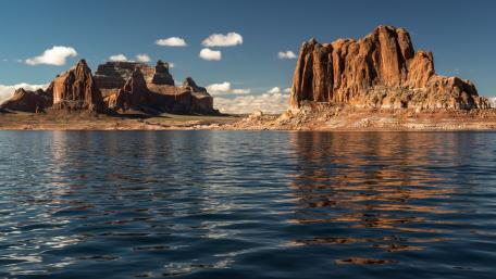 Majestic Rocky Reflections in Tranquil Water wallpaper
