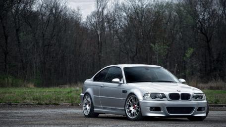 Sleek Silver BMW in Nature's Embrace wallpaper