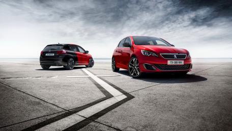 Dynamic Red Sport Cars on Minimalist Asphalt Surface wallpaper