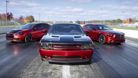 Dynamic Trio of American Muscle Cars wallpaper