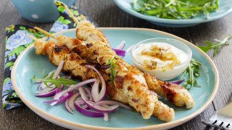 Delicious Chicken Skewers with Creamy Dip and Fresh Vegetables wallpaper