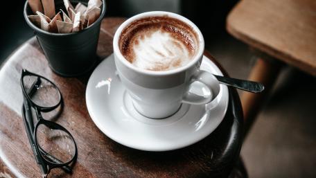 Cozy Coffee Moment in 4K Quality wallpaper