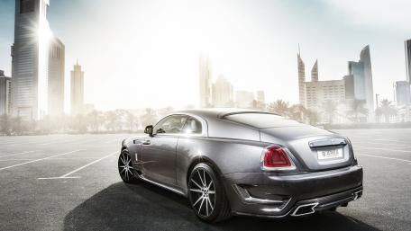 Sleek Luxury Car in a Modern Cityscape wallpaper