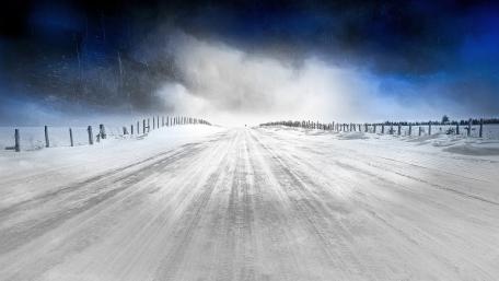 Winter Road on a Snowy Landscape wallpaper