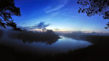 Serene Dawn by the Riverbank wallpaper