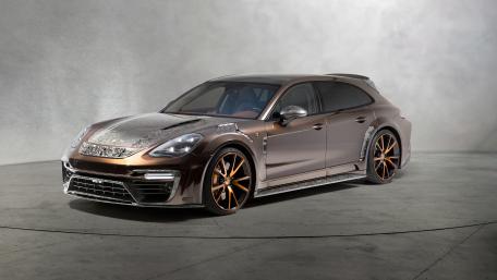 Sleek Brown Luxury Sports Car Wallpaper wallpaper
