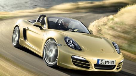 Elegant Convertible on Scenic Road wallpaper