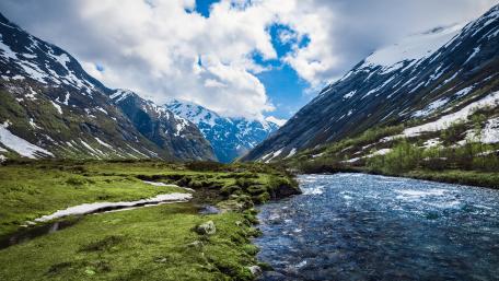 Majestic Mountain Landscape with River and Snow-capped Peaks wallpaper