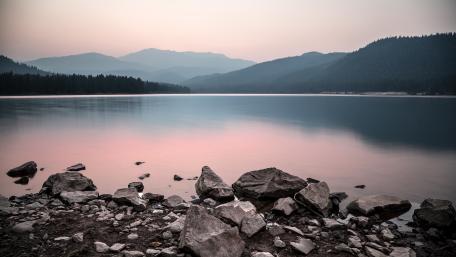 Serene Twilight Over Mountain Lake wallpaper