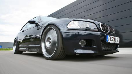 Sleek Black BMW M3 on the Move wallpaper