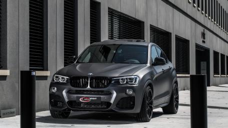 Sleek BMW X4 in Urban Setting wallpaper