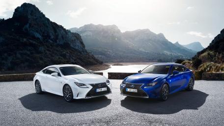 Sleek Luxury Coupes in Stunning Landscape wallpaper