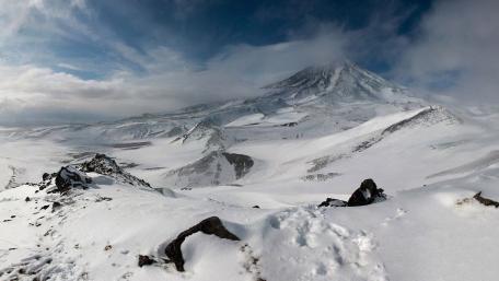 Majestic Snow-Capped Volcano in Winter Beauty wallpaper