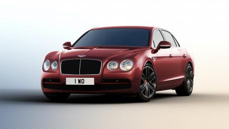Sleek Red Luxury Sedan Wallpaper wallpaper