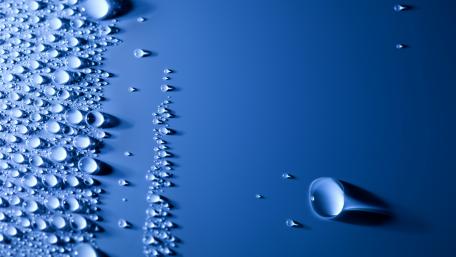 Blue Water Drops on Smooth Surface Wallpaper wallpaper