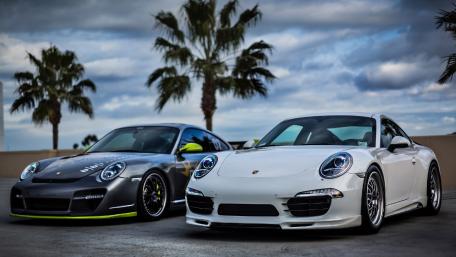 Sleek Porsches Under a Palm Sky wallpaper