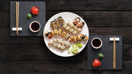 Sushi Delight on a Rustic Table wallpaper