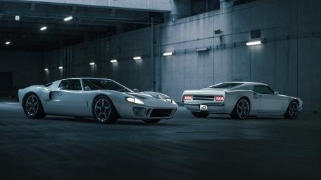 Sleek Vintage Cars in Dramatic Lighting wallpaper