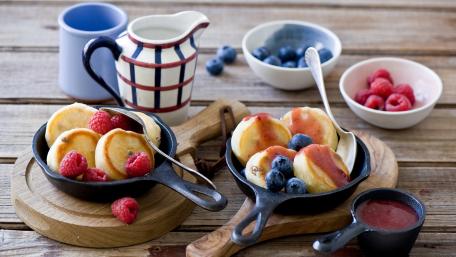 Deliciously Baked Pancakes with Fresh Berries wallpaper