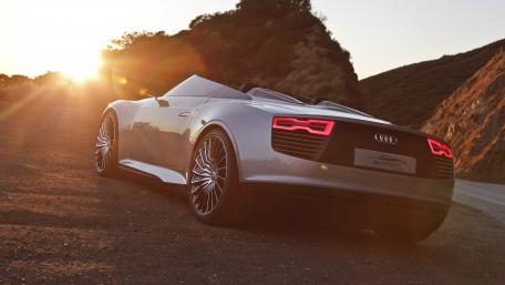 Sleek Audi e-tron Convertible at Sunset wallpaper