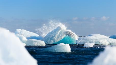 Majestic Icebergs in Crystal Blue Waters wallpaper