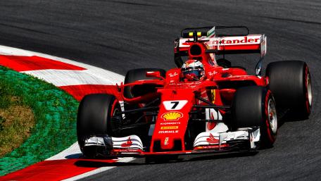 Ferrari Racing Through the Curves of Speed wallpaper