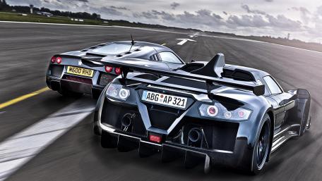 Ultimate Hypercar Duel on the Track wallpaper