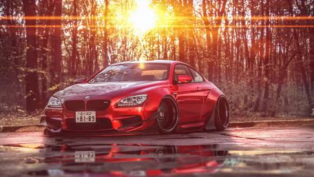 Dynamic Red Car in Golden Hour Glow wallpaper
