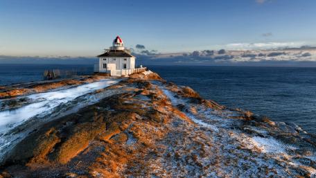 Lighthouse by the Serene Horizon wallpaper