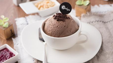 Delicious Chocolate Ice Cream in a Cozy Setting wallpaper